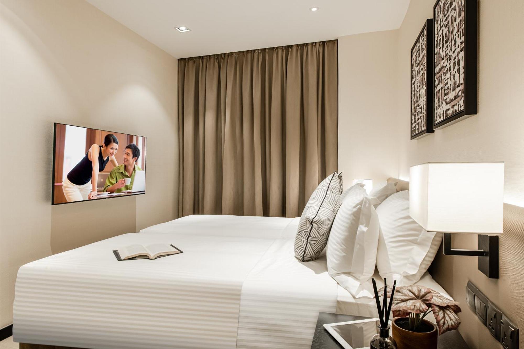 ホテル Ascott Star Klcc クアラルンプール エクステリア 写真 A bedroom at the hotel